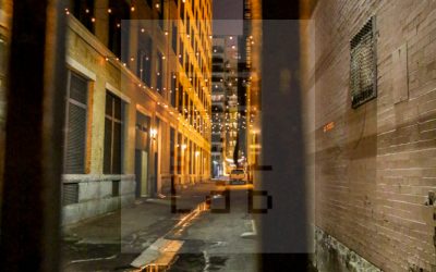 Between city buildings at night